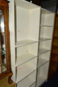 TWO WHITE OPEN BOOKCASES