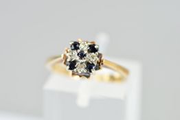 A MID TO LATE 20TH CENTURY SAPPHIRE AND DIAMOND CLUSTER RING, ring size J, hallmarked 9ct gold,