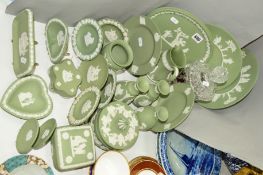 WEDGWOOD GREEN JASPER WARES to include pin trays, plates, a plaque, water jug, powder box and