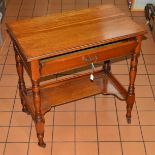 AN EDWARDIAN WALNUT RECTANGULAR WRITING TABLE, the hinged lid opening to reveal a fitted interior of