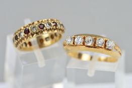 TWO DRESS RINGS, the first a 9ct gold red and colourless paste eternity ring, hallmarked