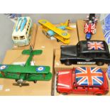 SIX MODERN TINPLATE MODELS to include a mini from 'The Italian Job', a London black cab, a VW camper