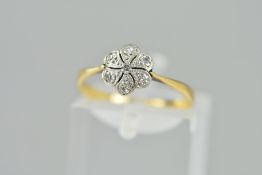 AN EARLY 20TH CEBTURY DIAMOND ROUND CLUSTER RING, ring size L1/2, stamped '18ct', approximate