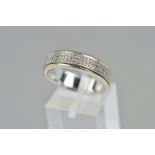 A DIAMOND BAND RING designed as a band ring with central rotating band of brilliant cut diamonds,
