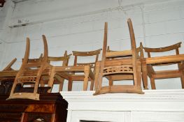 A SET OF EIGHT BEECH CHAIRS (one dismantled, no seat pads)