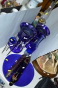 A PAIR OF BLUE GLASS LUSTRES, with droppers, height 31cm, an oil lamp, two glass rolling pins, a