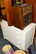A PAINTED CHEST OF THREE LONG DRAWERS, three painted chairs, a vintage radio and an oak open