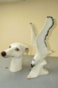 A ROYAL DUX ART DECO STYLE CERAMIC SCULPTURE OF A SEABIRD CRESTING A WAVE, height approximate
