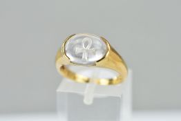 A MODERN 9CT GOLD SINGLE STONE ROCK CRYSTAL RING, oval cabochon with an engraved 'Ank' to the