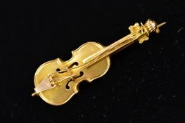 A 9CT GOLD BAR BROOCH IN THE FORM OF A VIOLIN, marked to the back 9.375, Birmingham 1889, length 3.