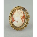A LATE 20TH CENTURY SHELL CAMEO BROOCH, oval cameo depicting a maiden in profile, twist rope and