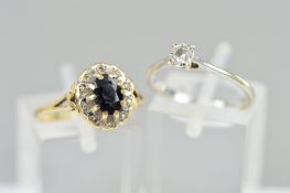 TWO 9CT GOLD GEM SET RINGS, the first a single stone diamond ring, the brilliant cut diamond