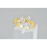 A MODERN 18CT GOLD DIAMOND OVAL CLUSTER CROSSOVER FANCY RING, estimated total diamond weight 0.18ct,