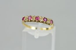 A LATE 20TH CENTURY RUBY AND DIAMOND HALF ETERNITY RING, ring size P1/2, hallmarked 9ct gold,