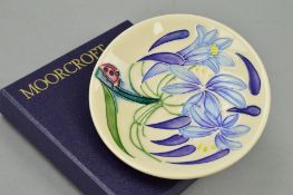 A BOXED MOORCROFT POTTERY TRINKET DISH, 'Fly Away Home', impressed and painted marks to base,
