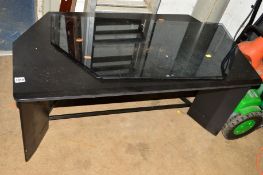 A BLACK TV STAND with two glass shelves