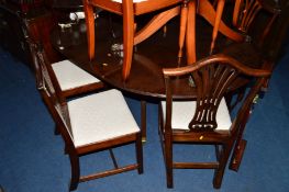 A REPRODUCTION MAHOGANY PEDESTAL EXTENDING DINING TABLE, with additional leaf, approximate