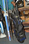 A GOLF CLUB, with clubs and a pair of Trak Nowak skis and poles