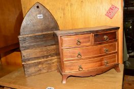 A MAHOGANY MINIATURE CHEST of two short and two long drawers, together with an oak stepped spoon