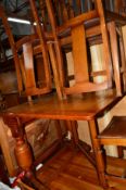 AN OAK DROP LEAF TABLE and five various chairs (6)