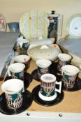 A PORTMEIRION 'MAGIC CITY' SIX PLACE COFFEE SET, together with two Midwinter 'Hollywood' serving