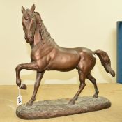 AUSTIN PROD 'A PRINTEMPS', a bronzed spelter sculpture of a horse on a textured base dated 1978 (