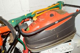 A FLYMO ELECTRIC HOVER LAWN MOWER and a Reflex Plus electric strimmer (2)