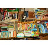 SIX BOXES OF BOOKS to include childrens books, Ordnance Survey maps, 'A Dog Day' by Walter Emanuel