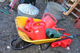 A WHEELBARROW containing seven plastic watering cans, together with four galvanised bins (12)