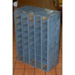 A METAL SHELVING UNIT OF FORTY DIVISIONS, painted grey, height 86cm x width 60.5cm x depth 30cm (