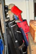 TWO BAGS WITH GOLF CLUBS