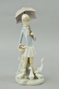 A LLADRO FIGURE GROUP, girl with ducks holding an umbrella, height 27cm