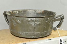 A LIBERTY & CO PEWTER TWIN HANDLED ROSE BOWL DESIGNED BY DAVID VEASEY, moulded with rose bushes,