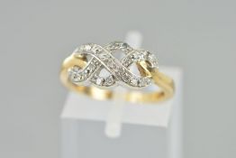 A 9CT GOLD DIAMOND DRESS RING, of open scrolling design set with single cut diamonds, foreign