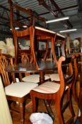 A REPRODUCTION MAHOGANY OVAL TOPPED PEDESTAL DINING TABLE and four chairs (5)