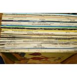 A BOX OF 33RPM LP RECORDS to include classical, musicals and French speaking lessons