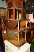 AN ERCOL DROP LEAF TEA TROLLEY, a set of four ercol chairs (situated by lot 1215) a circular