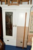 A PAINTED EARLY 20TH CENTURY MIRRORED TWO DOOR WARDROBE, above a single long drawer, approximate
