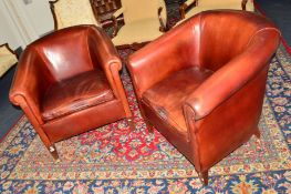 A PAIR OF OX BLOOD LEATHER TUB CHAIRS (sd)