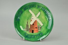 A MOORCROFT POTTERY PLATE, 'John Webb's Windmill' made for Thaxted Guildhall Trustees, impressed and