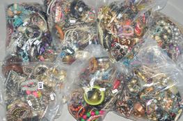 SEVEN BAGS OF COSTUME JEWELLERY, to include bangles, necklaces, bracelets etc