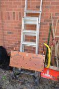 A BLACK AND DECKER WORKMATE and two pairs of aluminium step ladders