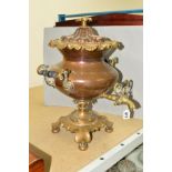A COPPER AND BRASS SAMOVAR, in classical style on a leaf shaped base with bun feet, approximate