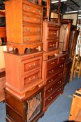 A CHERRYWOOD CHEST of two short and four long drawers, a matching pair of three drawer bedside