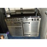 A LEISURE PROFESSIONAL RANGE COOKER with stainless steel and black finish, width 110cm