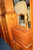 A PINE BLANKET CHEST, dressing table with three drawers and separate mirror and a pair of three