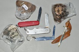 A SELECTION OF COINS AND THREE PENKNIVES, to include various one penny coins including Victoria