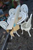 A WHITE PAINTED CAST ALUMINIUM GARDEN TABLE, four chairs and a parasol (6)