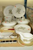 SUSIE COOPER 'IRIS' DINNERWARES, for eight places plus spares to include serving dishes etc, 40
