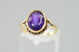 A MODERN AMETHYST SINGLE STONE RING, oval amethyst measuring approximately 10mm x 8mm, ring size